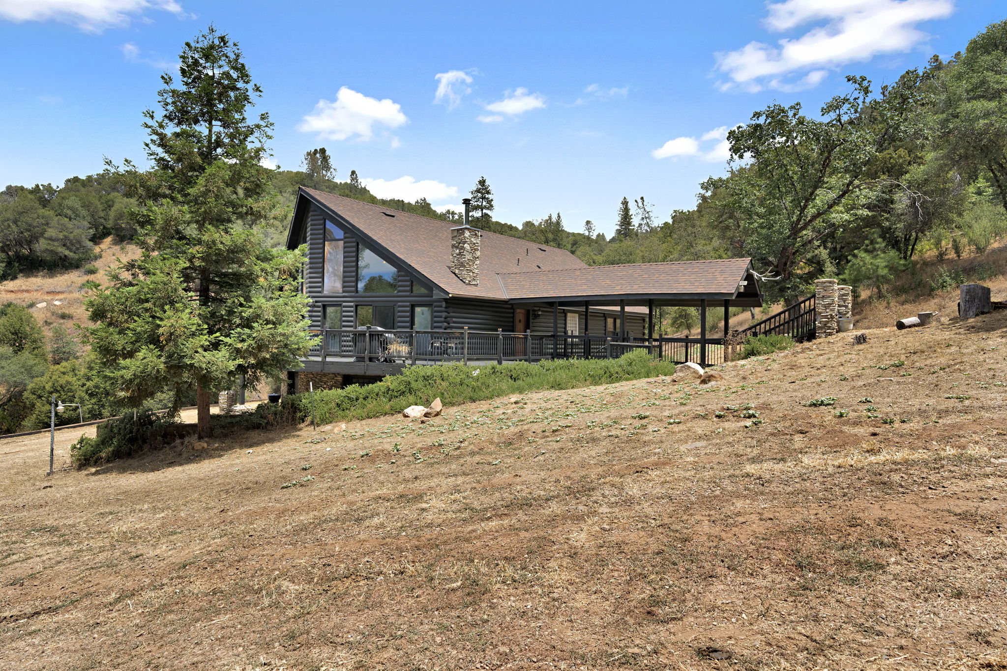 Ranch lodge nestled into oak woodland
